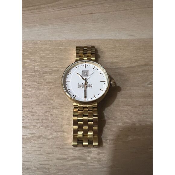 LulaRoe Vestal Trainer Gold Tone Watch w/‎ Date Window Leader Working - Picture 1 of 4